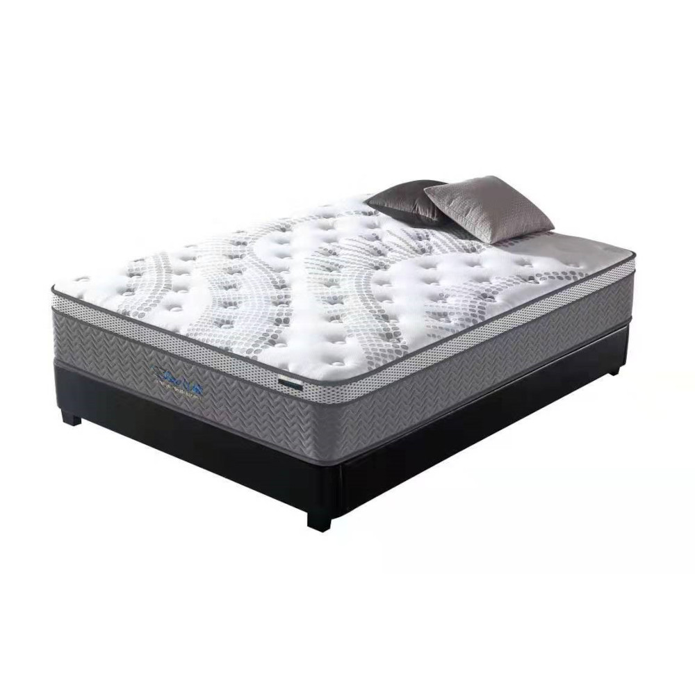 Pocket sprung mattress with a base on a white background Des Kelly