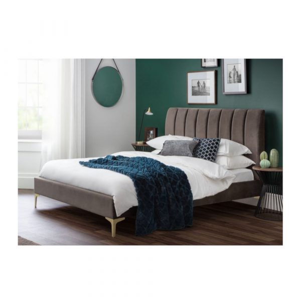 Bed frame with mattress in a bedroom
