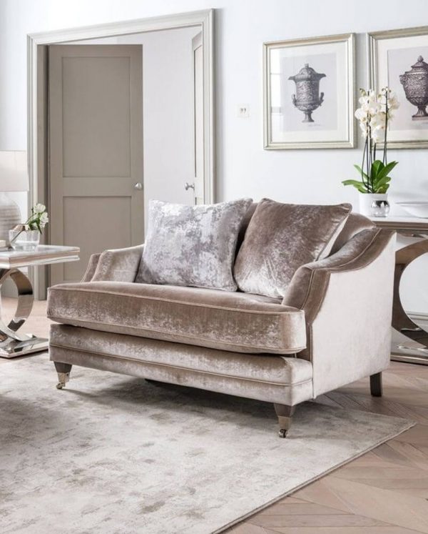 Belvedere 2 seater champagne colored sofa on a rug