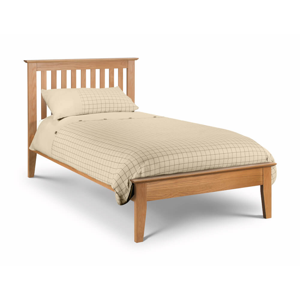 Solid wood bed frame on a white background Des Kelly