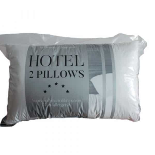 pair of soft hotel pillows on a white background