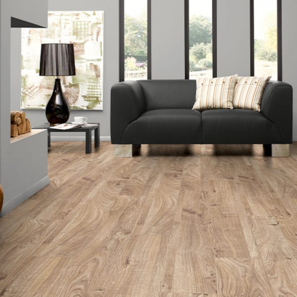 Long everest oak wood flooring with a sofa on top