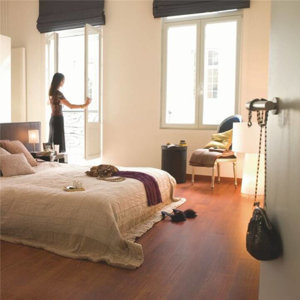 Quickstep merbau wood floors in a bedroom Des Kelly