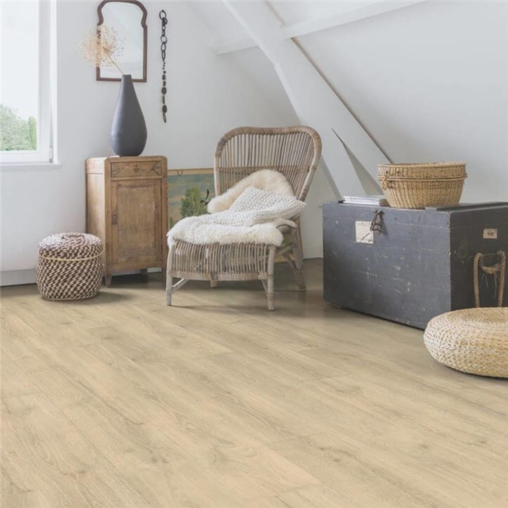 Quickstep old beige wood flooring with an armchair on top