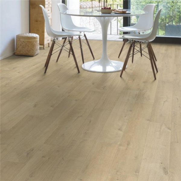 Impressive soft oak quickstep flooring with a dining set in the background