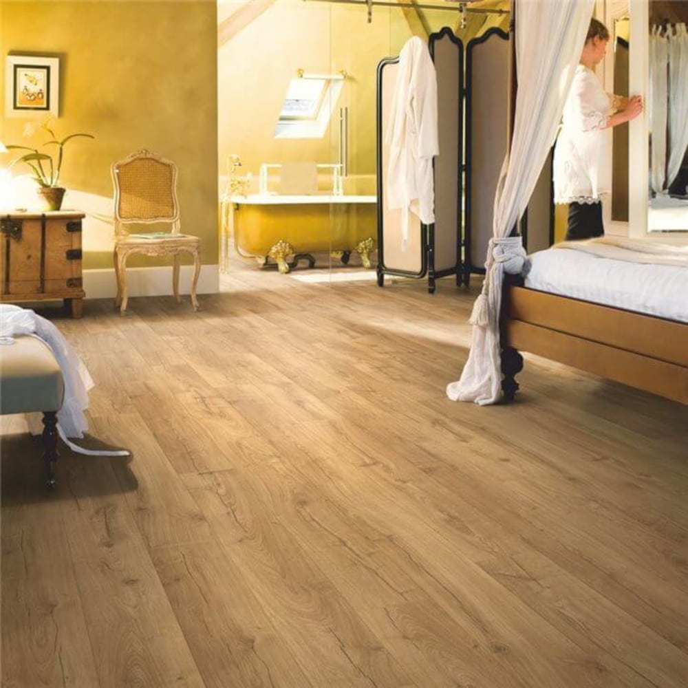 Quickstep impressive ultra classic oak wood flooring in a bedroom