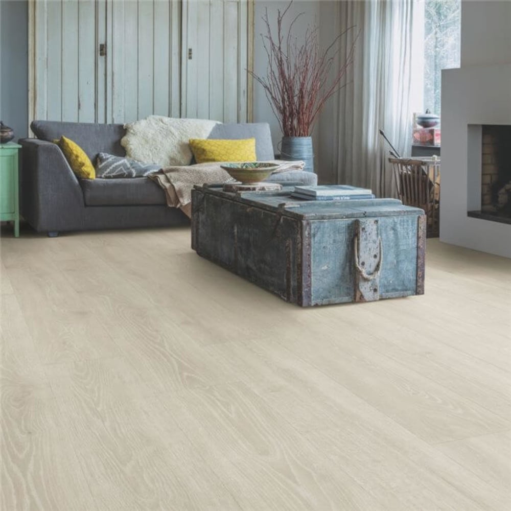 Quickstep majestic grey wood floor with a sofa on top
