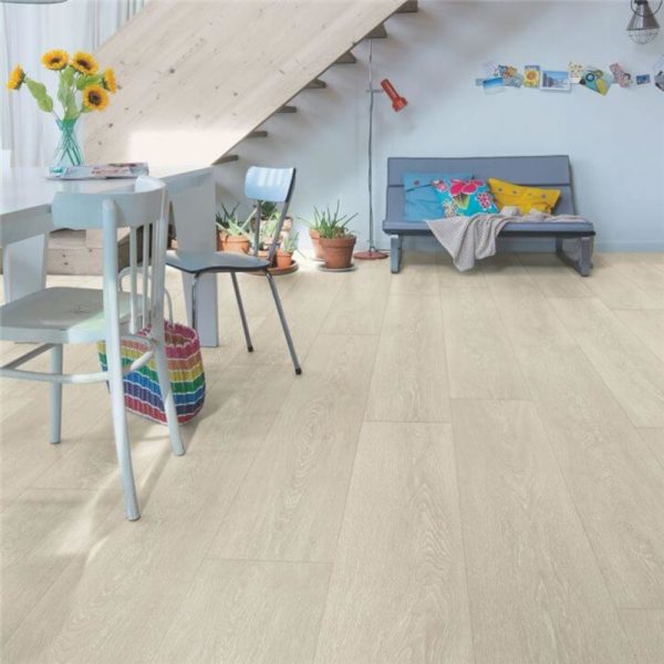 Quickstep wooden light beige flooring with a dining set on top