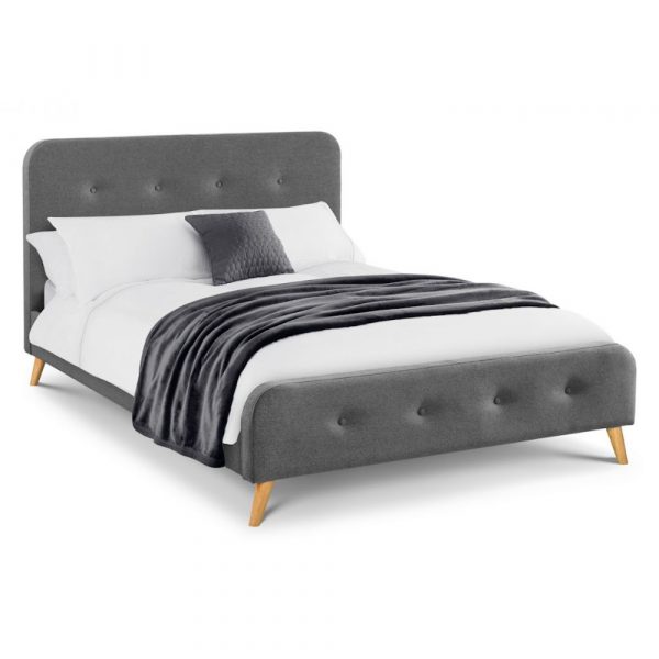 Grey divan bed frame with a mattress on top Des Kelly