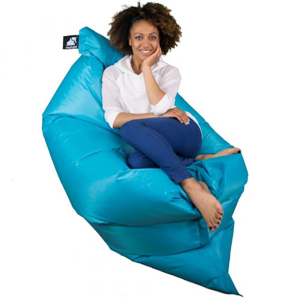 Jumbo ocean turquoise bean bag with an adult sitting on top