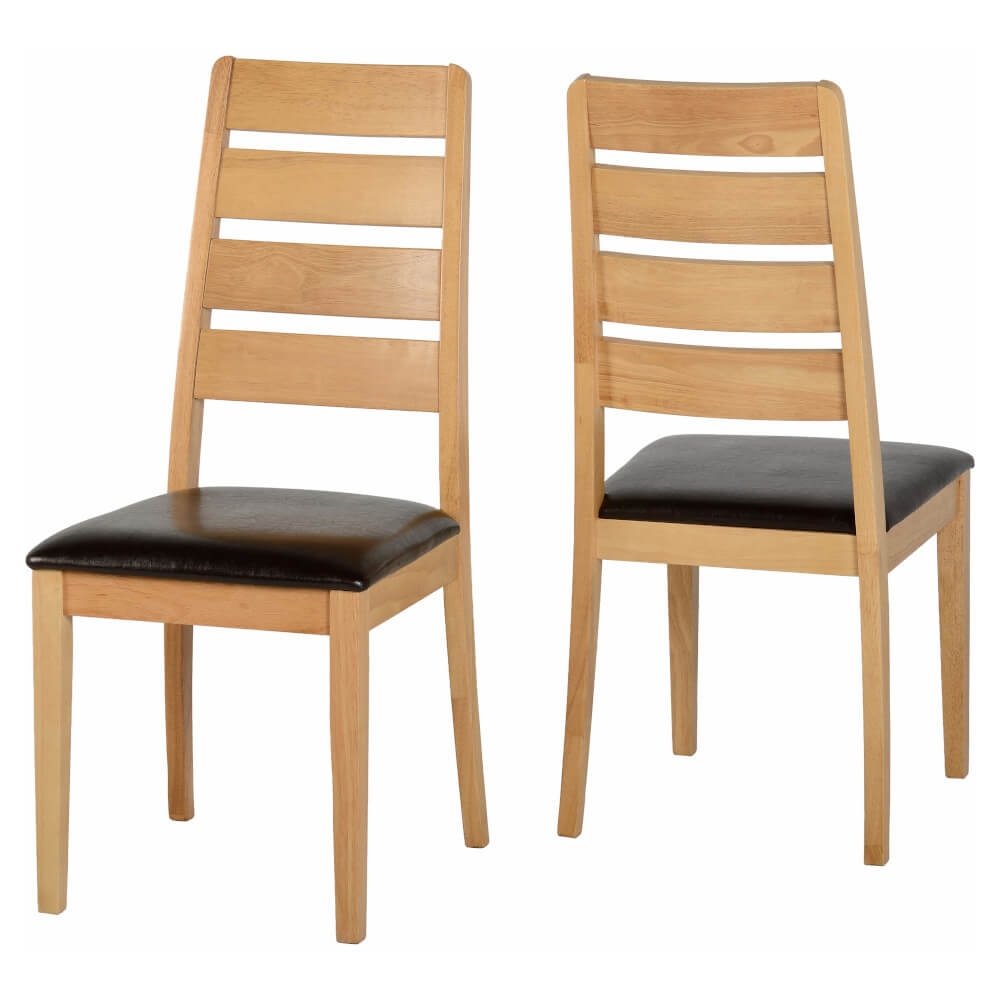 2 solid wood chairs with a cushion from Des Kelly Interiors