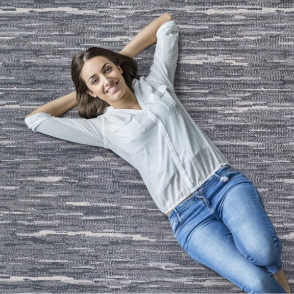 Woman relaxing on some comfy carpet