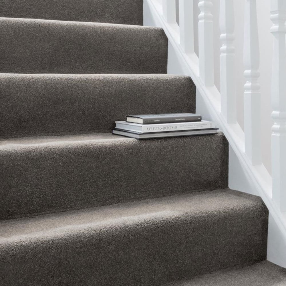 Carpet on the stairs with books on a step