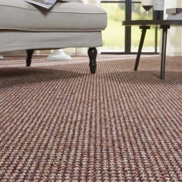 Indian carpet with furniture on the background